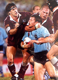 Martin Lang and Jason Smith combine to tackle Jason Stevens in a State of Origin match